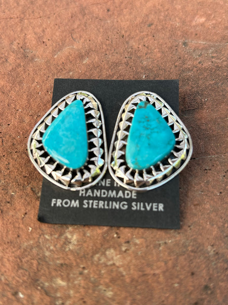 Sharon McCarthy, Navajo silversmith made these beautiful genuine turquoise and sterling silver earrings.  NM149