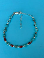 Campitos Turquoise with Italian red coral and sterling silver bracelet.  AS707. Adjustable from 7 to 8”