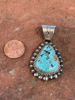 Navajo Handcrafted sterling silver and genuine turquoise pendant, 2” top to bottom, LZ098