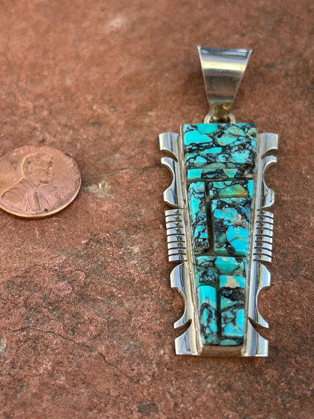 Navajo handcrafted sterling silver and genuine turquoise inlay, 2.75” top to bottom,  LZ117