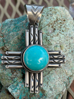 Navajo handcrafted sterling silver and genuine turquoise, 2.75” top to bottom, LZ118