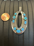 Navajo handcrafted sterling silver pendant with Lab Opal.  LZ295