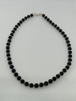 Handcrafted black onyx and sterling silver necklace, 19” long. SR1117