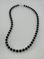 Handcrafted black onyx and sterling silver squares necklace. 18” long. SR1116