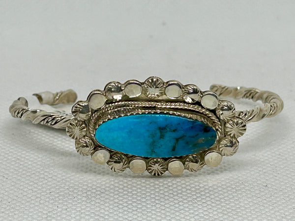 Navajo handcrafted sterling silver with genuine turquoise bracelet by Fernando Delgarito.  LZ808