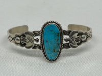 Navajo handcrafted sterling silver and genuinely  turquoise bracelet.  LZ810