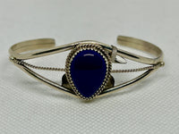 Navajo handcrafted sterling silver and genuine lapis stone bracelet by Phillip Yazzie.  LZ816