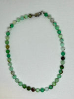 Chrysoface necklace with hypoallergenic stainless steel space beads and clasp, 15” long.  EP105