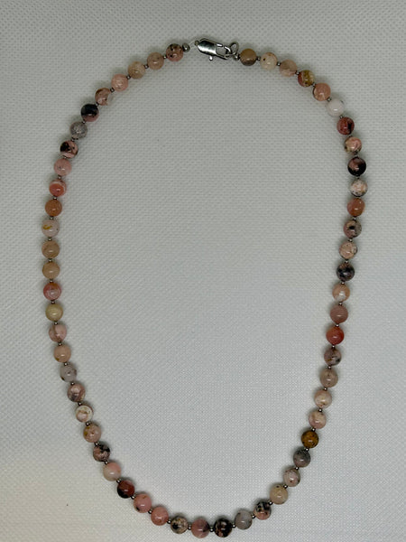 Genuine Rhodochrosite stone necklace with hypoallergenic stainless steel beads and clasp.  19” long, EP120