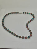 Handcrafted Jade and copper composite stone 20” necklace with hypoallergenic stainless steel beads and clasp.  EP140