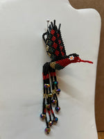 Hummingbird ornament handcrafted in Guatemala using glass seed beads.  BZ207