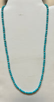 Turquoise stones with sterling silver strung into a fine quality necjkacw. SR2065