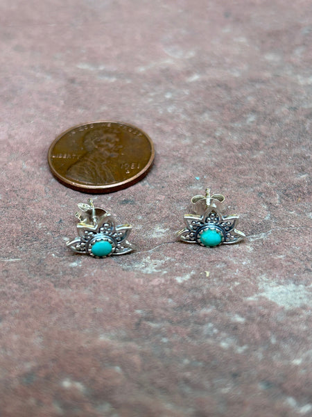 Sterling silver and genuine turquoise post earrings. PS18