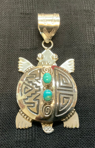 Sterling silver and genuine turquoise turtle pendant by Alonzo Mariano, Navajo. NM102