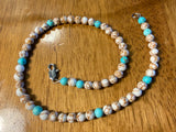 Handcrafted Howlite and turquoise stone 16”  necklace with stainless steel clap.  EP142