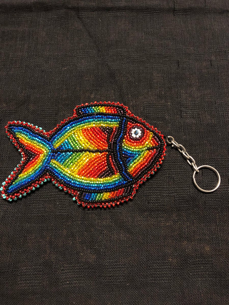 Guatemalan handcrafted glass bead round change purse with key ring. 3.5” diameter.  Fish design.