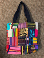 Handwoven Guatemalan cotton patches fashioned into a sturdy shoulder bag, fully lined with one zipper pocket. 15” x 17”