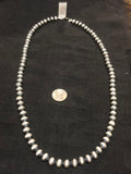 Navajo Pearl Style oxidized sterling silver beads in 7mm and 24” long.  JK23