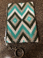 Coin bag beaded on both sides with glass beads and a key ring.