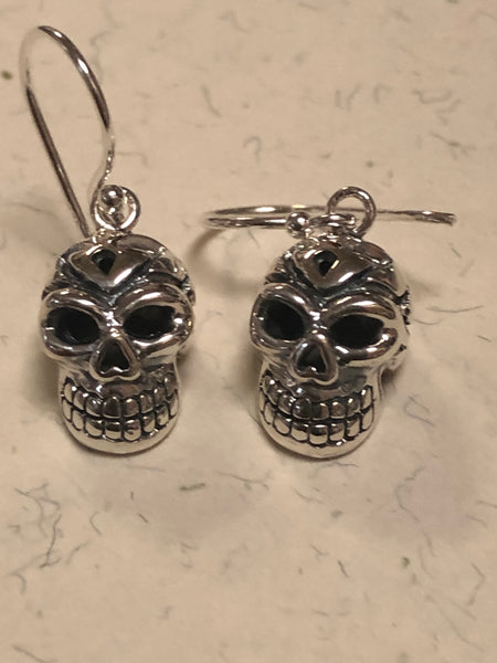 Sterling silver skull earrings. PS16